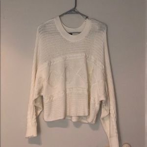 Cream cable-knit sweater